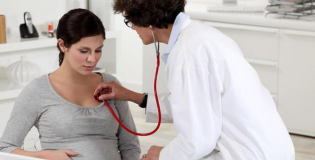 Беременная у врача